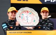 Lando Norris and Oscar Piastri pose with a trophy at the F1 Hungarian GP- Source: Getty